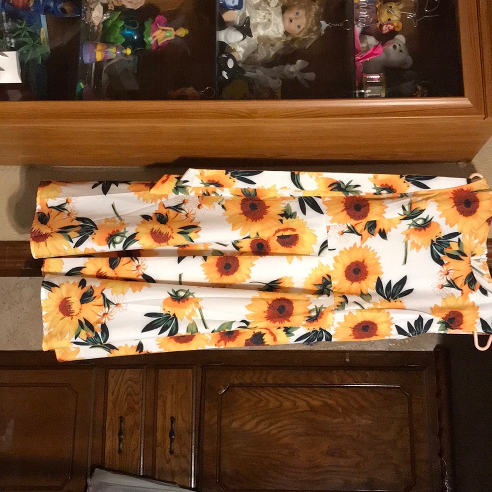 Sunflower dress never been worn.